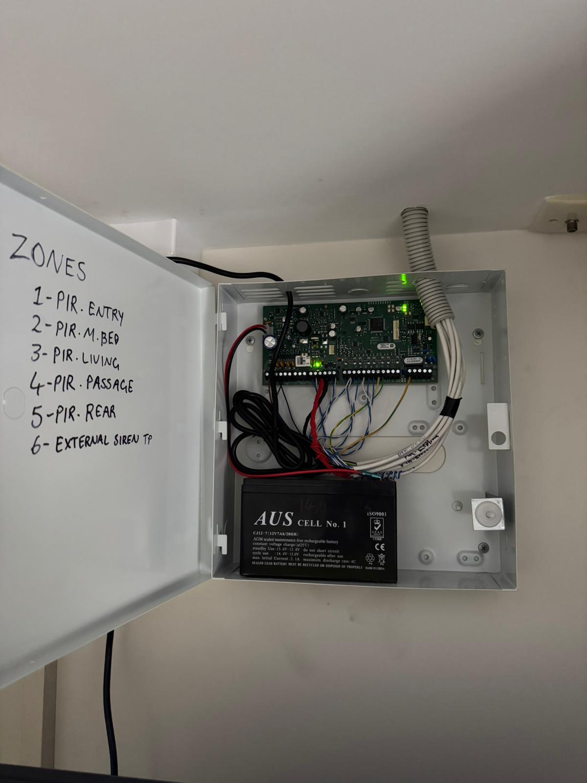 Bosch alarm panel — zones labelled, battery backed